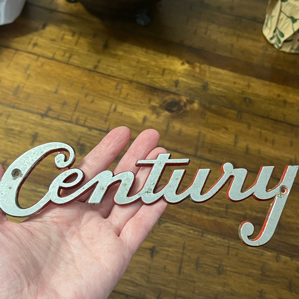 1970s Century Script Emblem